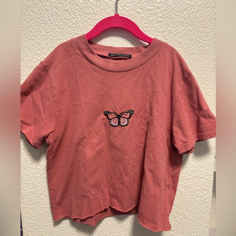 Brandy Melville cropped shirt, not sure what size but I think small